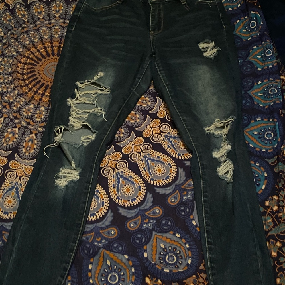 Ripped blue skinny jeans